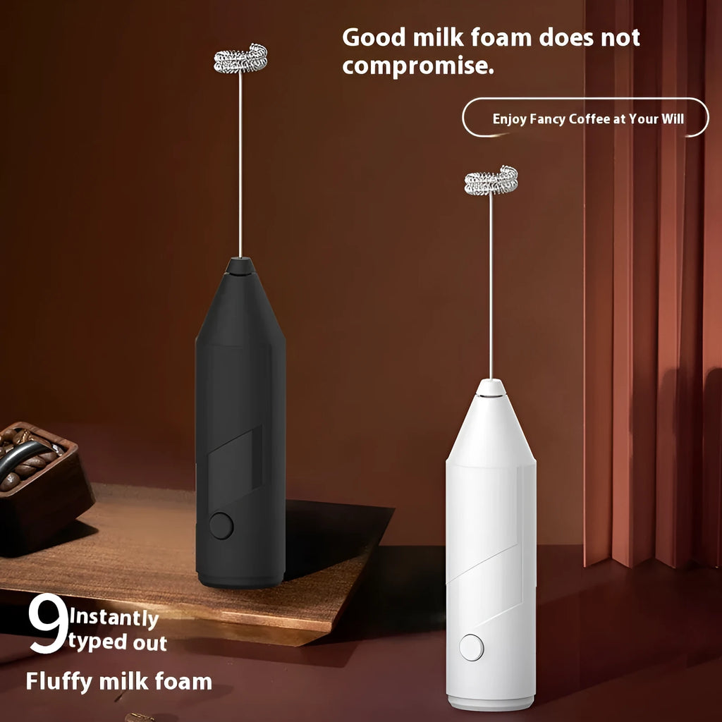 Mini handheld electric milk frother with stainless steel whisk in black, white, and khaki colour options.