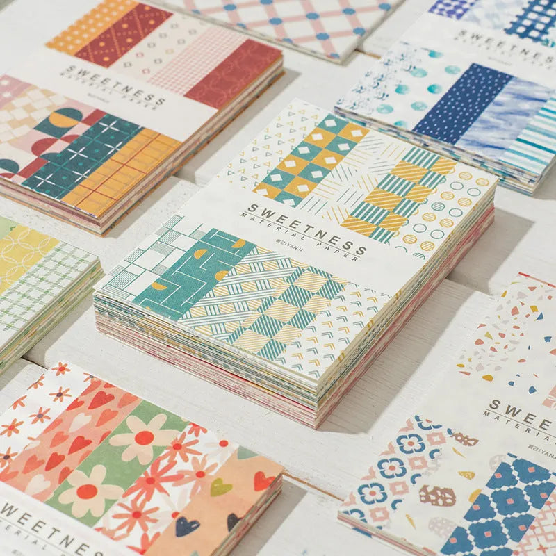 Fifty sheets of retro collage note paper in dessert colours, each measuring 56 by 83 millimetres.