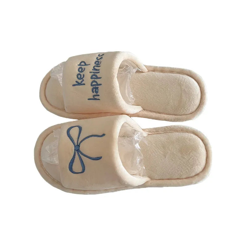 Ladies cotton slippers with letter pattern, bow, suede upper and flat non-slip PVC sole in beige yellow, pink or black