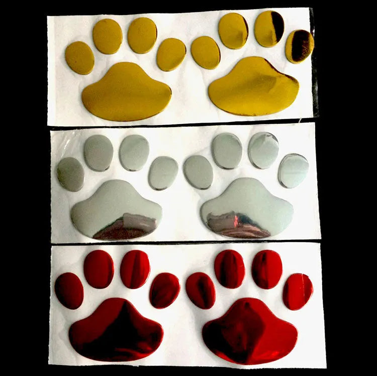 PVC hand-shaped car sticker with dog footprints in red, silver, gold, and black colour options.