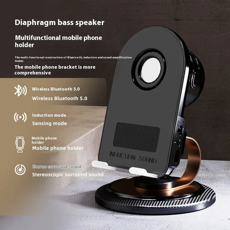 Black Gold folding Bluetooth mobile phone stand with wireless charger pad on a desk