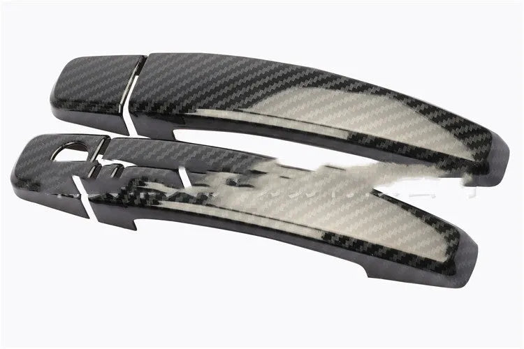 Carbon fibre pattern door handle cover for Opel Vauxhall Astra H and J models 2004 to 2015.