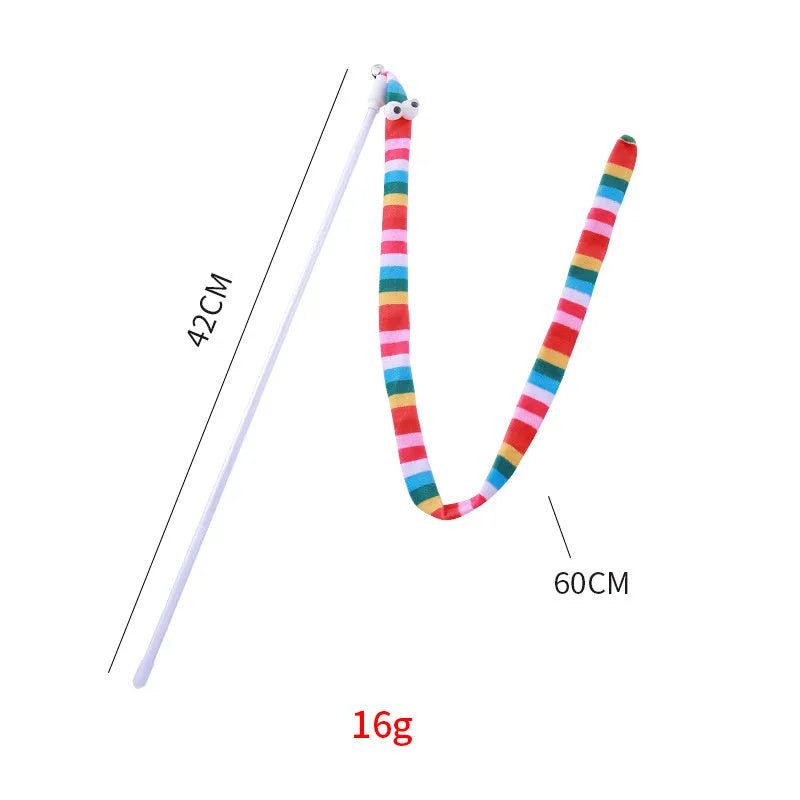 Cat wand toy with a polycarbonate pole and a long colourful plush strip with a bell, held in a person's hand.