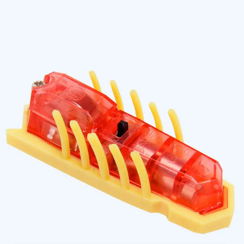 Mini electric bug pet toy with ladybird beetle shape showing angular legs and compact 4.5 cm PVC construction