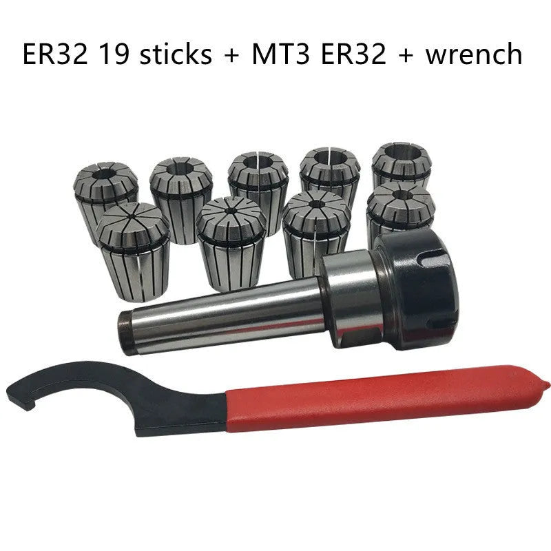 ER32 collet set with 19 collets, Morse taper arbor, and wrench on workbench