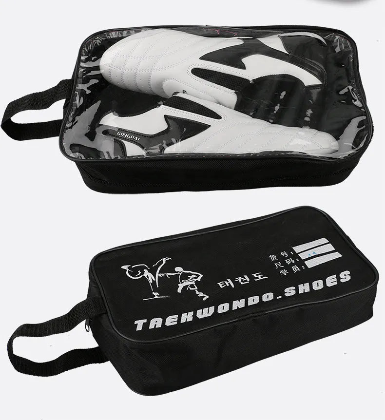 Black and white children's martial arts training shoes with a soft bottom and widened fit for Sanda and Taekwondo.