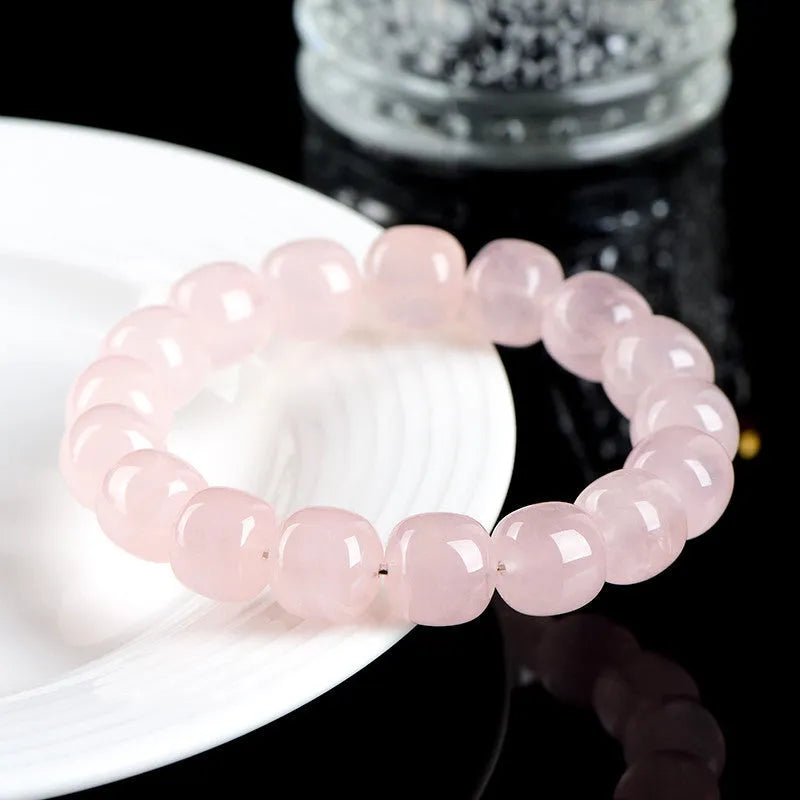 Pink crystal barrel bead bracelet with 11-12mm geometric beads and unisex design