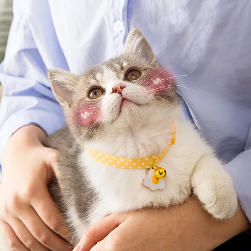 Adjustable pet collar with metal bell pendant and fabric bow tie decoration in choice of colours