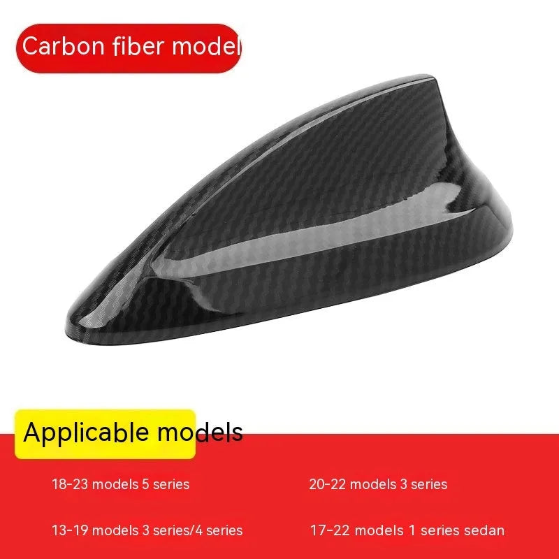 BMW shark fin antenna cover in carbon fibre pattern and piano black finishes