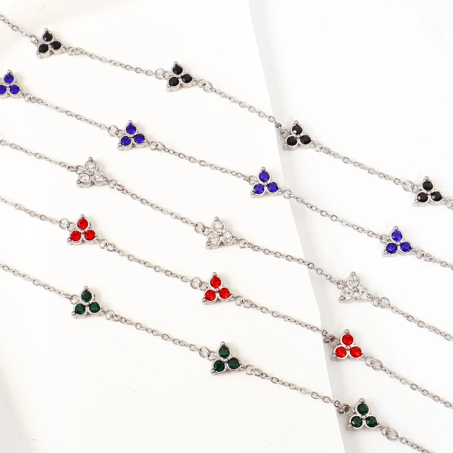 Women's stainless steel three diamond geometric bracelet with triangular design and zircon gemstones