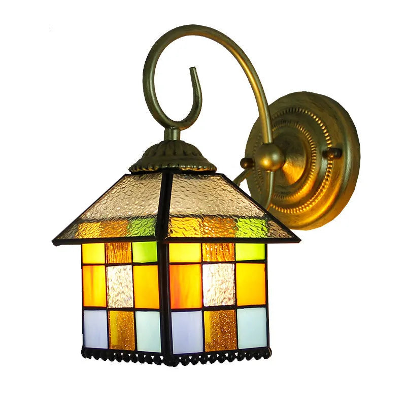 A coloured stained glass wall lamp mounted on a corridor wall, showing one of six available style variants.