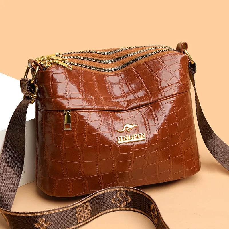 Brown PU leather cross body messenger bag with multiple compartments and sandwich pocket design