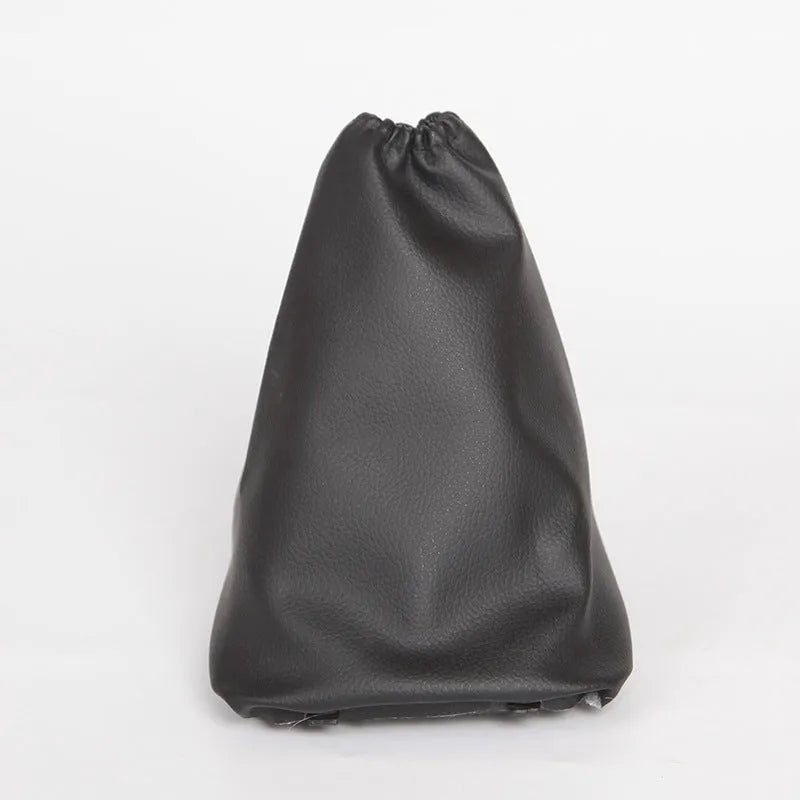 Black leather shift lever cover for Toyota Corolla cars measuring 15.2 by 12.9 cm