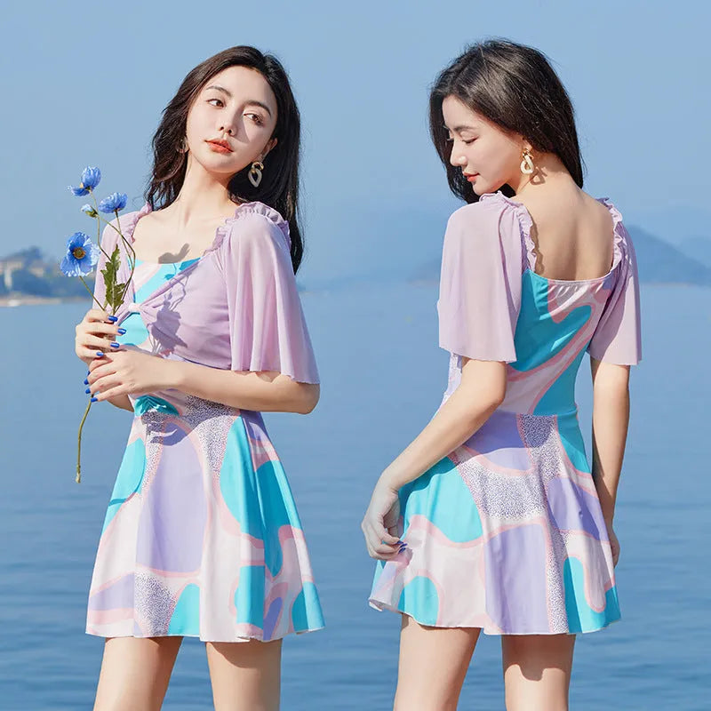 Women's floral high-waist one-piece swimsuit with bowknot detail in light purple or light blue patterns