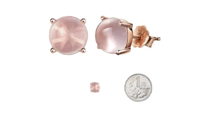 Women's rose gold plated stud earrings with a drop-shaped synthetic rose quartz stone.