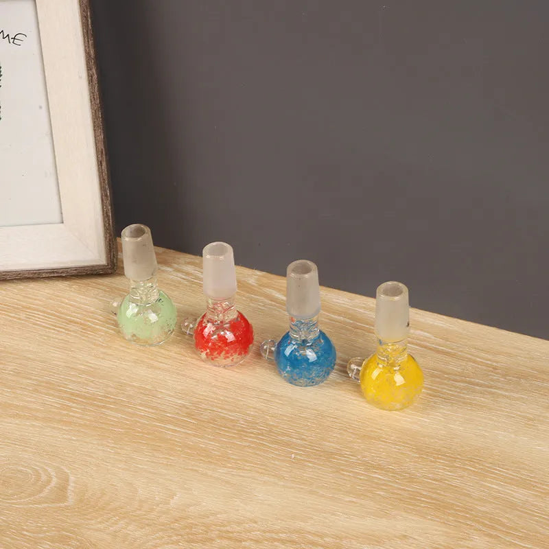 Coloured transparent glass tobacco pipe with geometric trumpet shape measuring 7cm