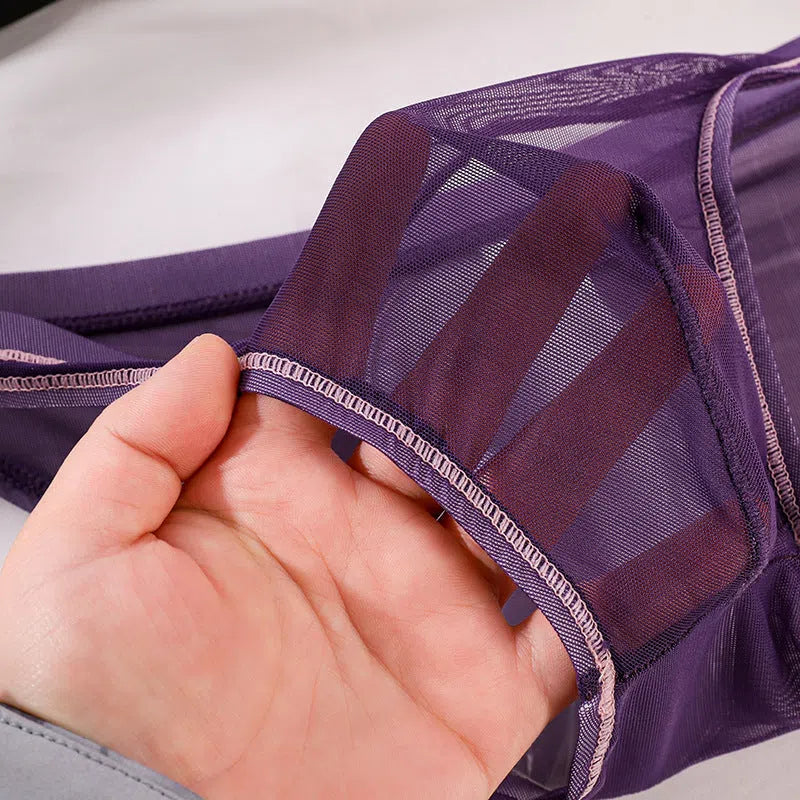 Men's seamless nylon triangle briefs in breathable stretch knit, available in 8 colours and 5 sizes M to XXXL