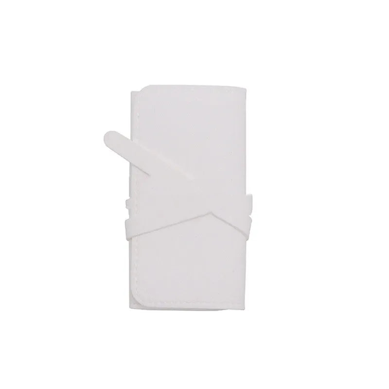 Soft brown leather and microfiber jewellery storage bag showing compact 12cm size.