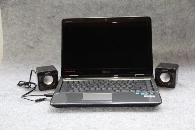 Small black square 2.0 USB computer speaker for Model 700B PC on a desk