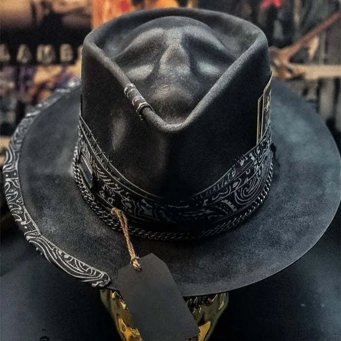 Handmade wool skull hat with a conical crown, shown in its specified colour, laid flat.