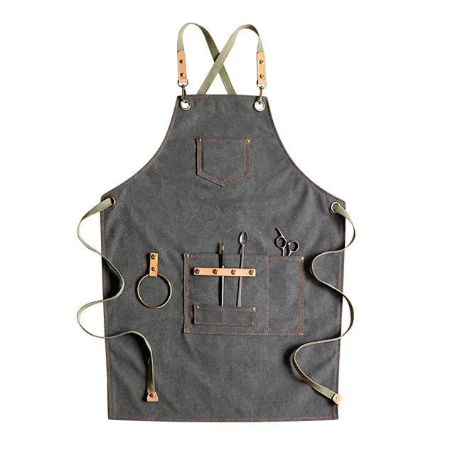 Canvas work apron with cross-back straps in camel colour for cafe and baking use