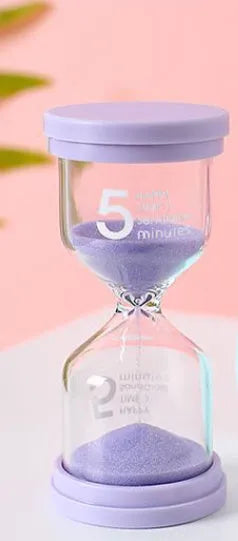 Handmade glass sand timer showing quicksand flow in blue colour option