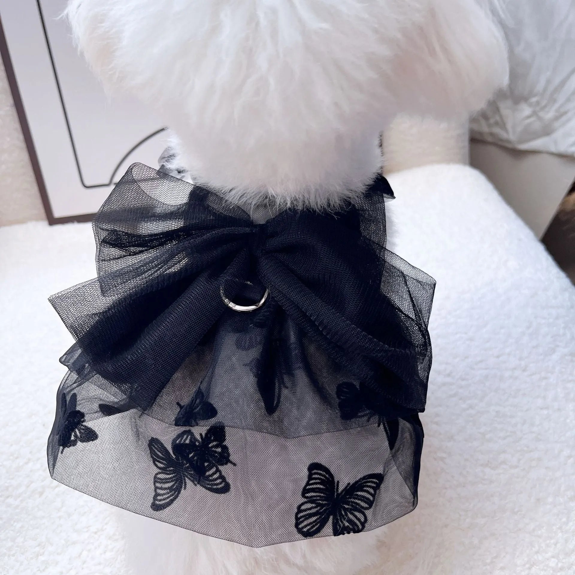 Black gauze tulle skirt pet costume for small to medium dogs and cats on a mannequin.
