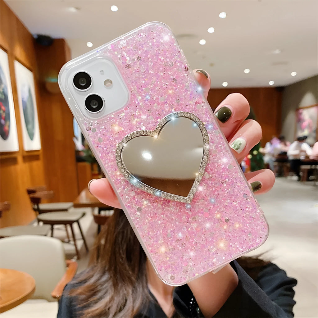 Epoxy mirror heart shape rhinestone phone case in glitter gold for Apple iPhone showing full coverage design