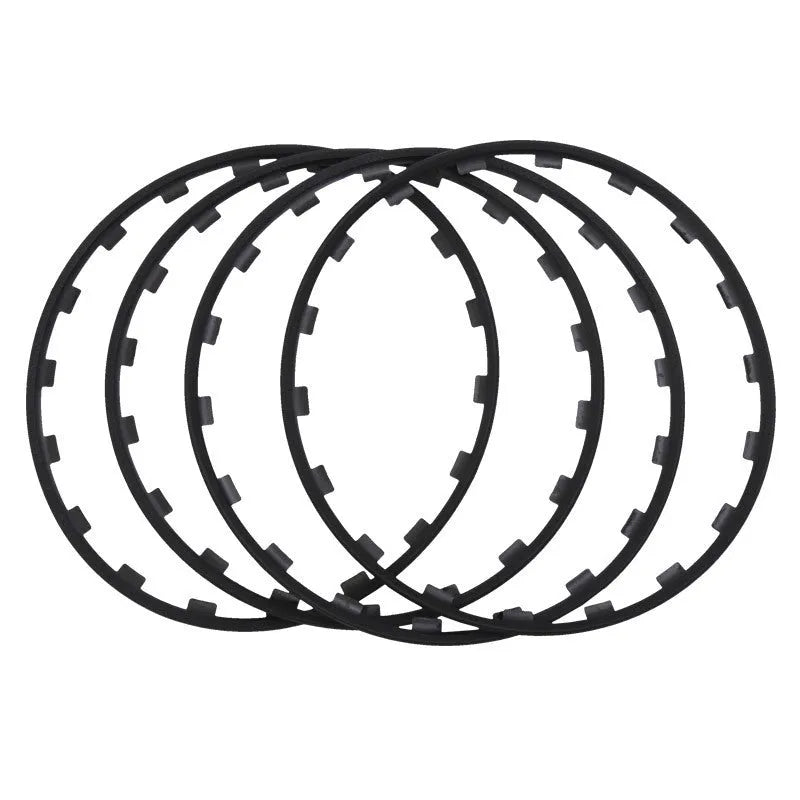 Set of four coloured nylon wheel hub guard rings in sizes 16 to 20 inches.