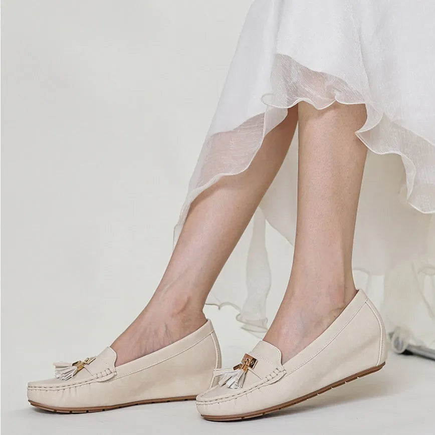Women's casual work shoes with flat heel height increasing insoles in nude colours with round toe and slip-on design