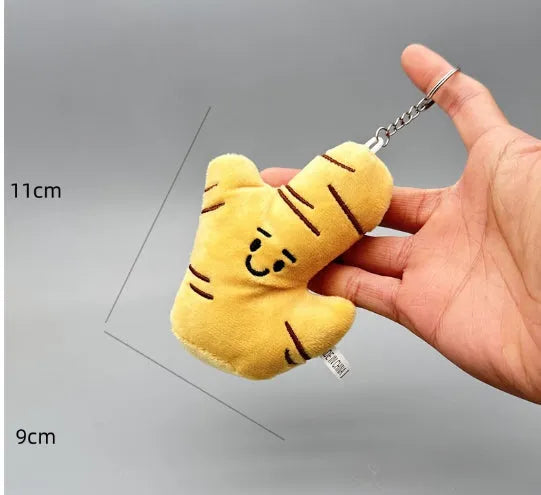 Funny vegetable plush keychain featuring onion, garlic, and broccoli pendants on a ring
