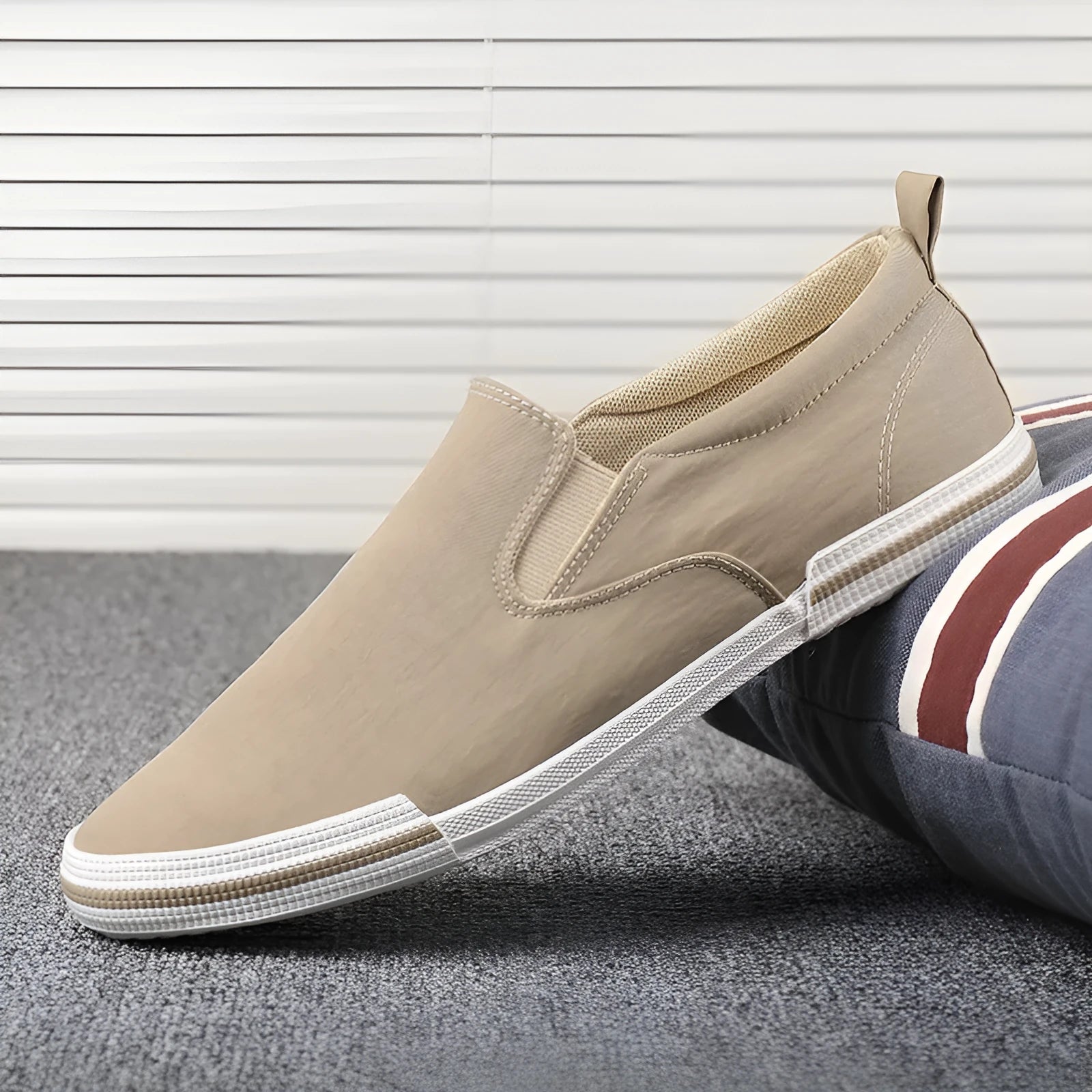 Men's low-top casual canvas shoes in grey, black orange, or khaki with vulcanised rubber soles.