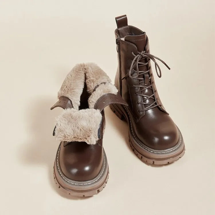 Retro British style platform ankle boots with front lace-up, horseshoe heel, and visible stitching in black