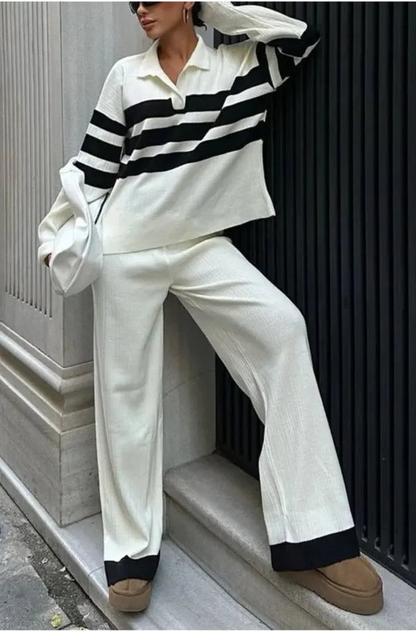Women's black and white striped knitted two-piece set with polo collar top and trousers