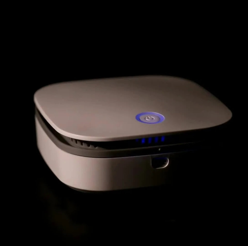 White USB-powered portable air purifier for cars and small rooms with a composite filter.