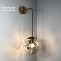 Modern glass wall lamp in gold or silver finish with LED light source