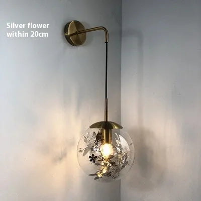 Modern glass wall lamp in gold or silver finish with LED light source