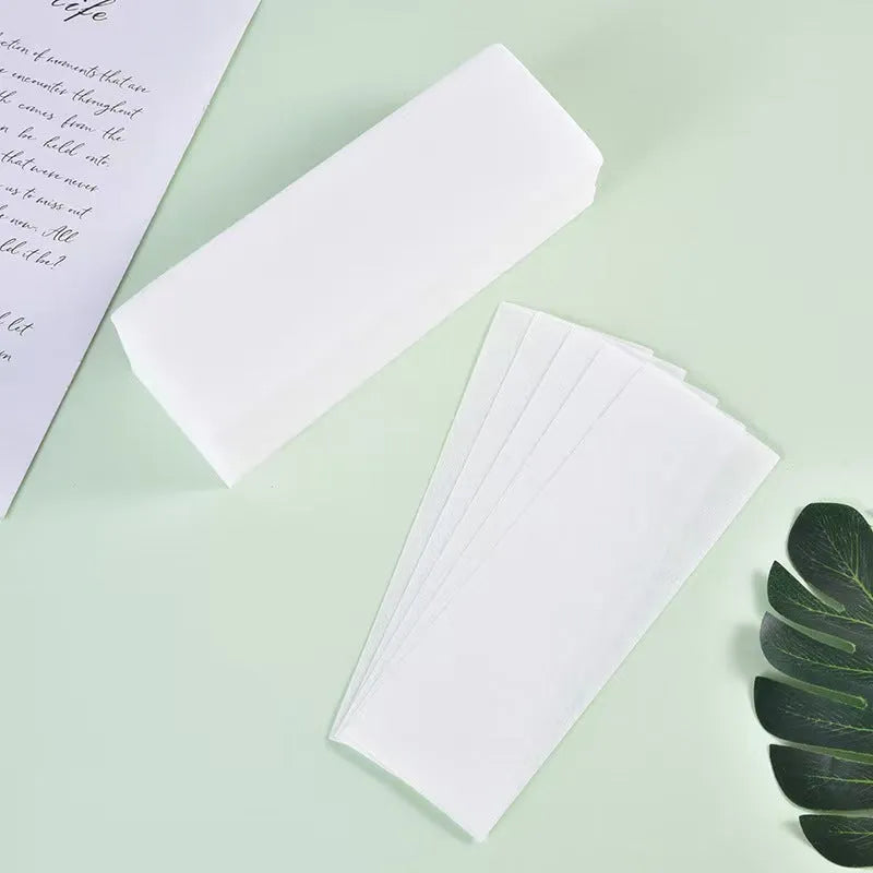 Non-woven fabric hair removal wax strips in 50 or 100 piece packaging