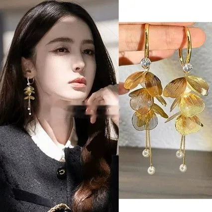Floral petal pearl fringe earrings in gold with electroplated alloy and tassel drop design