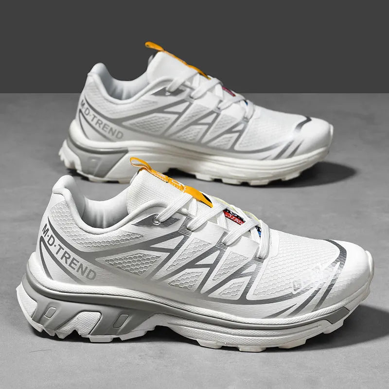 Men's and women's low-top round toe hiking shoes in artificial leather with a lace-up front.