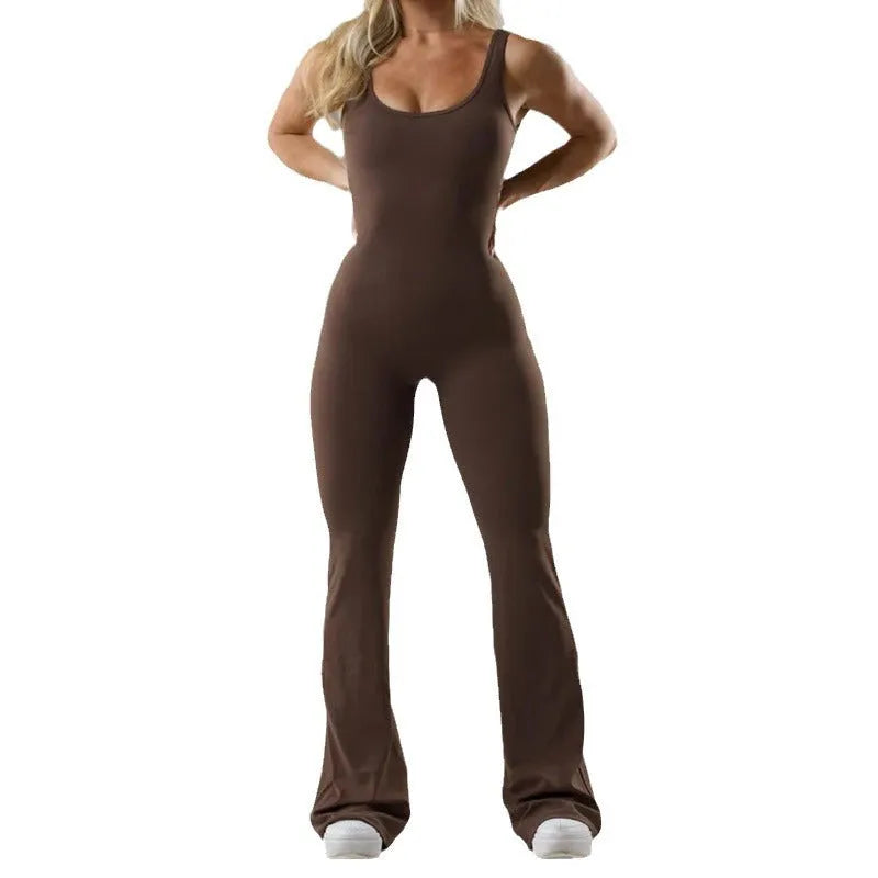 Close-up view of a black seamless women's yoga bodysuit with a mid-waist and trousers length.