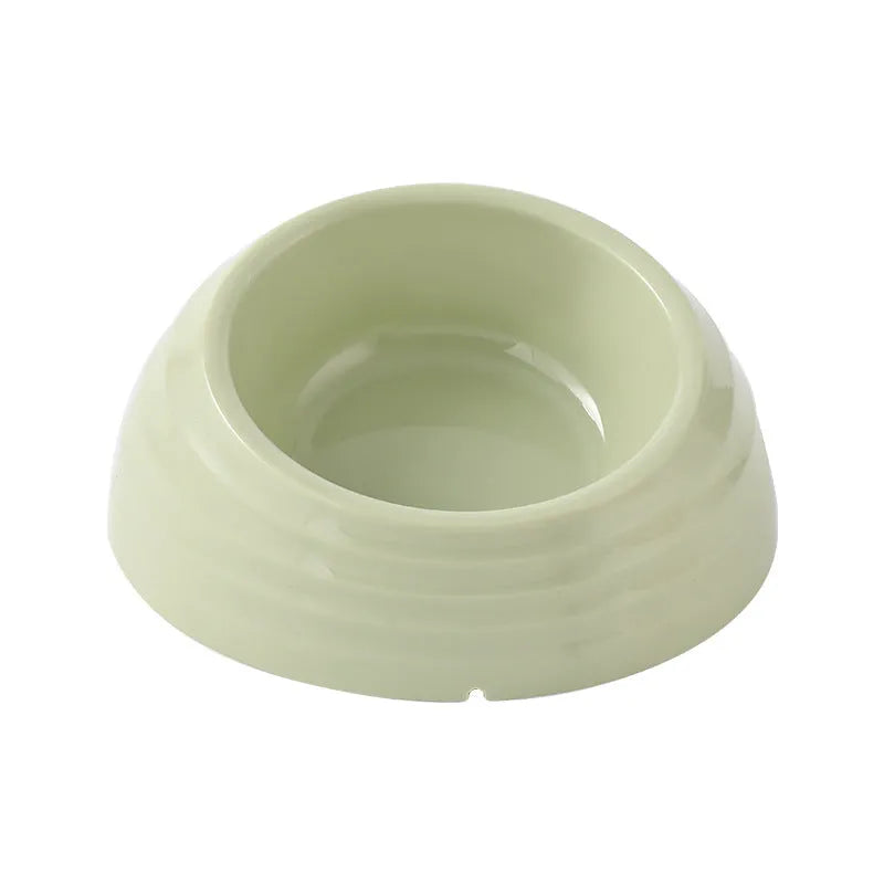 Stainless steel cat bowl in plastic base available in beige, brown, and light green colour variations