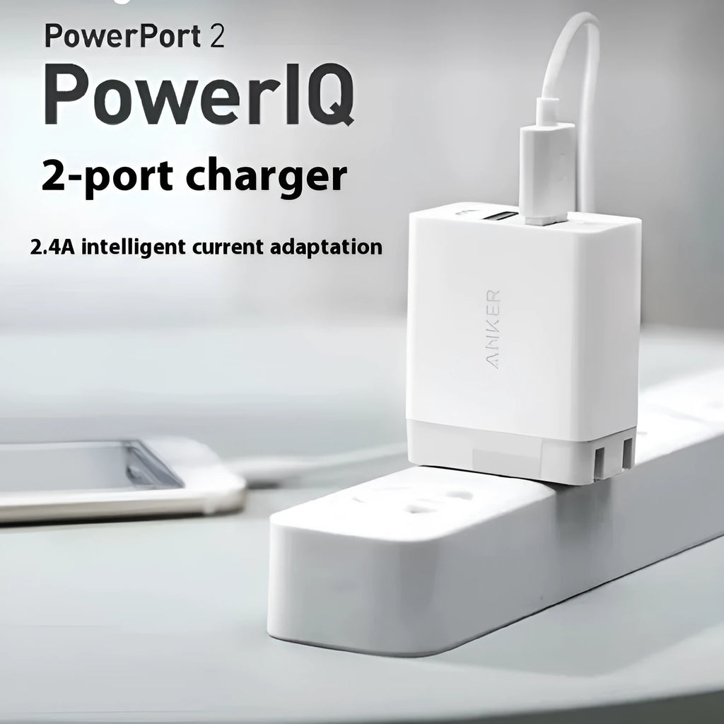 White dual-port 12W USB charger with national standard plug on a plain background