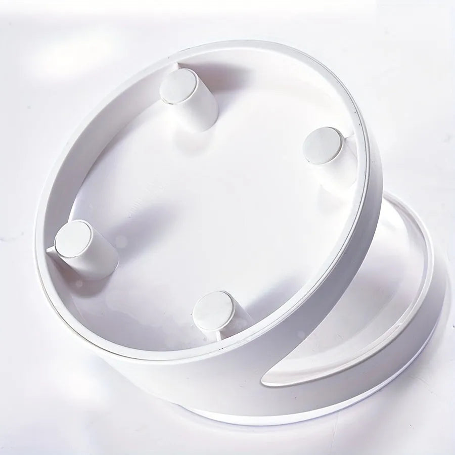Clear plastic elevated cat food bowl with a tilted feeding platform.