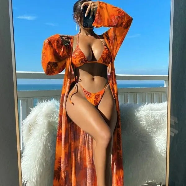 Women's long sleeve swimsuit set with bikini bottoms and cover-up robe in blue colour