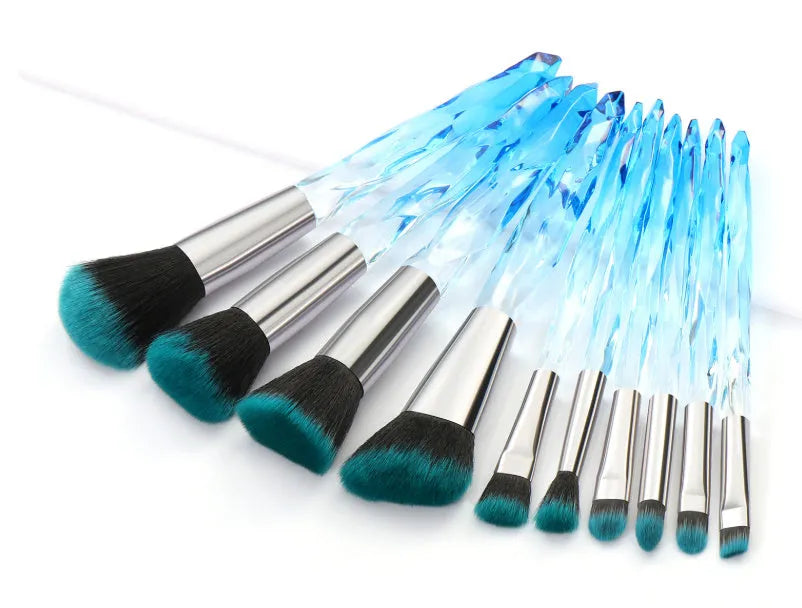 Ten crystal handle foundation brushes with artificial fibre bristles in a set, showing colour options.