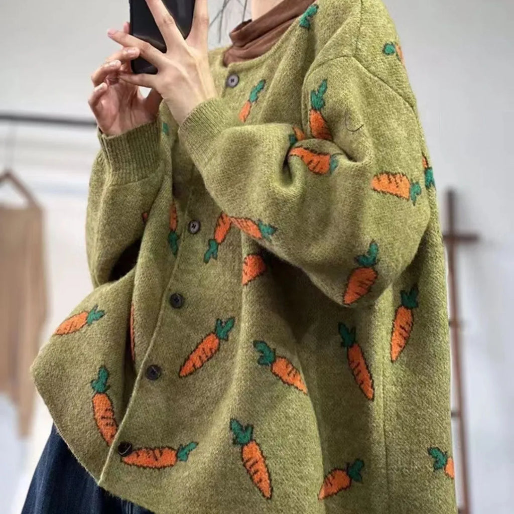 Round neck loose cardigan sweater with artistic colour contrast printing, made from viscose fibre.