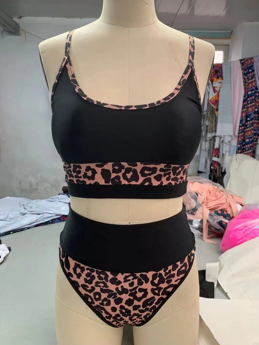 Women's high waist split bikini swimsuit in leopard print or white colours with adjustable ties