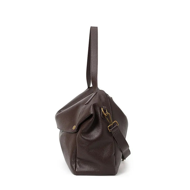 Brown genuine leather women's shoulder bag with a structured horizontal square shape.