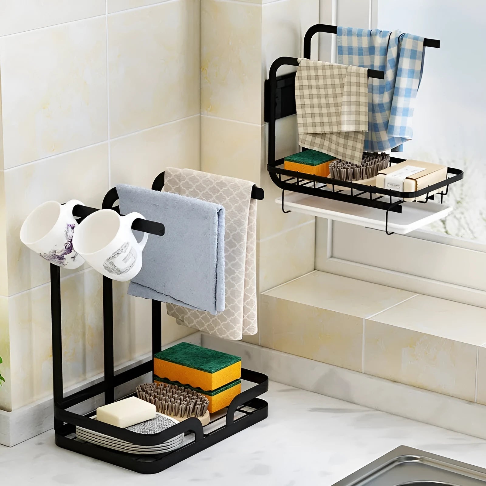 Foldable white plastic kitchen rack for wall mounting or desktop use, holding a sponge and cloth.